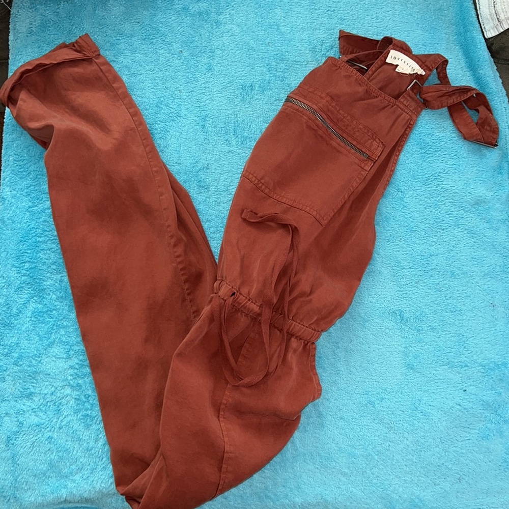 Lovestitch Burnt-Orange jumpsuit/romper. Size small.